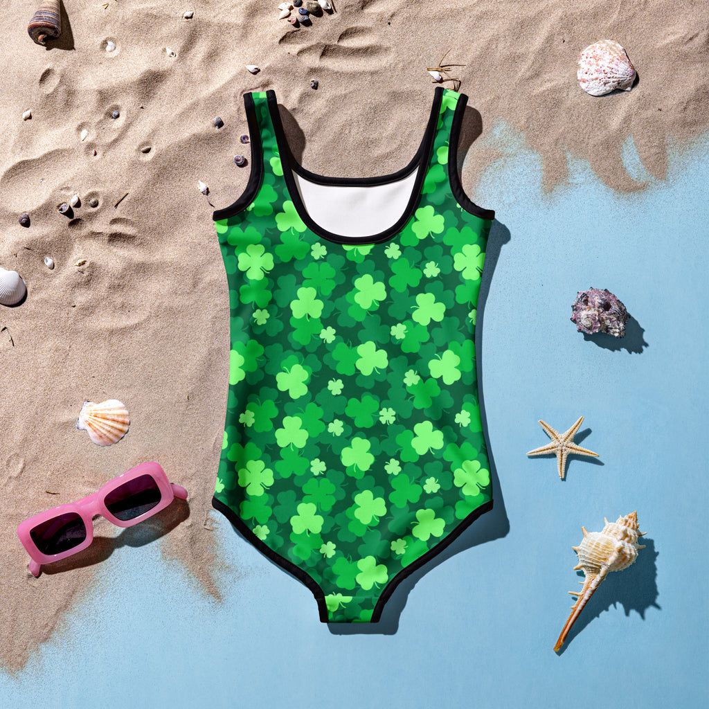 Girls green one-piece swimsuit with shamrock pattern black trim buttery soft fabric and UPF 50 plus protection