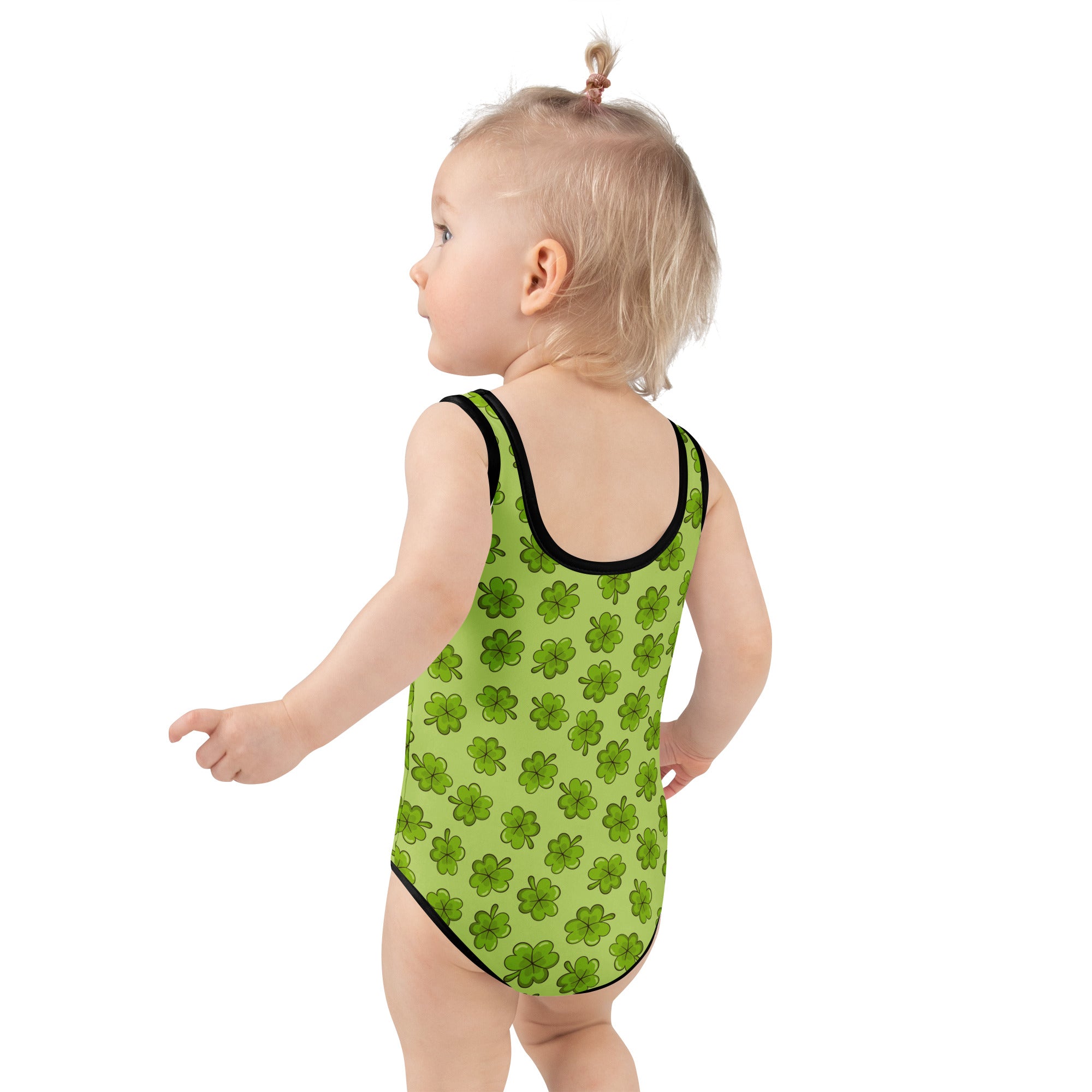 A lime green girls one-piece swimsuit with black trim clover pattern buttery soft fabric UPF 50 plus double layered front
