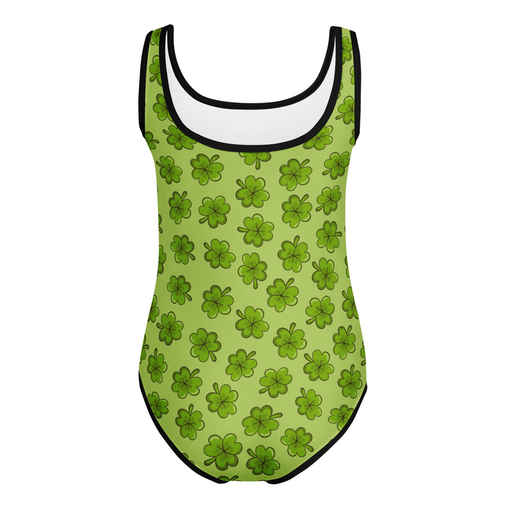 A lime green girls one-piece leotard with black trim and four-leaf clover pattern for dance and gymnastics