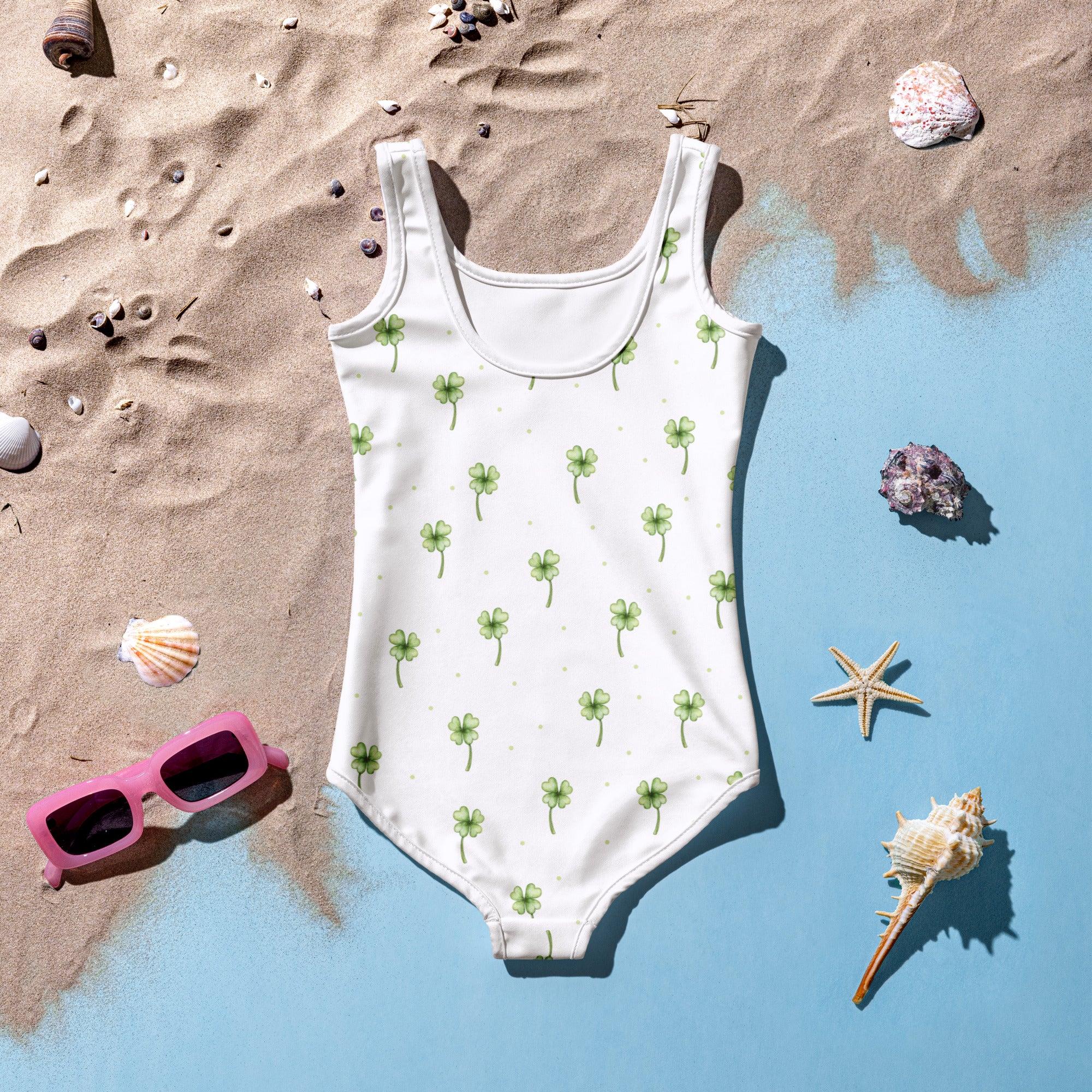 Girls minimal shamrock buttery soft white swimsuit with green clovers gold dots upf 50 plus double layered front