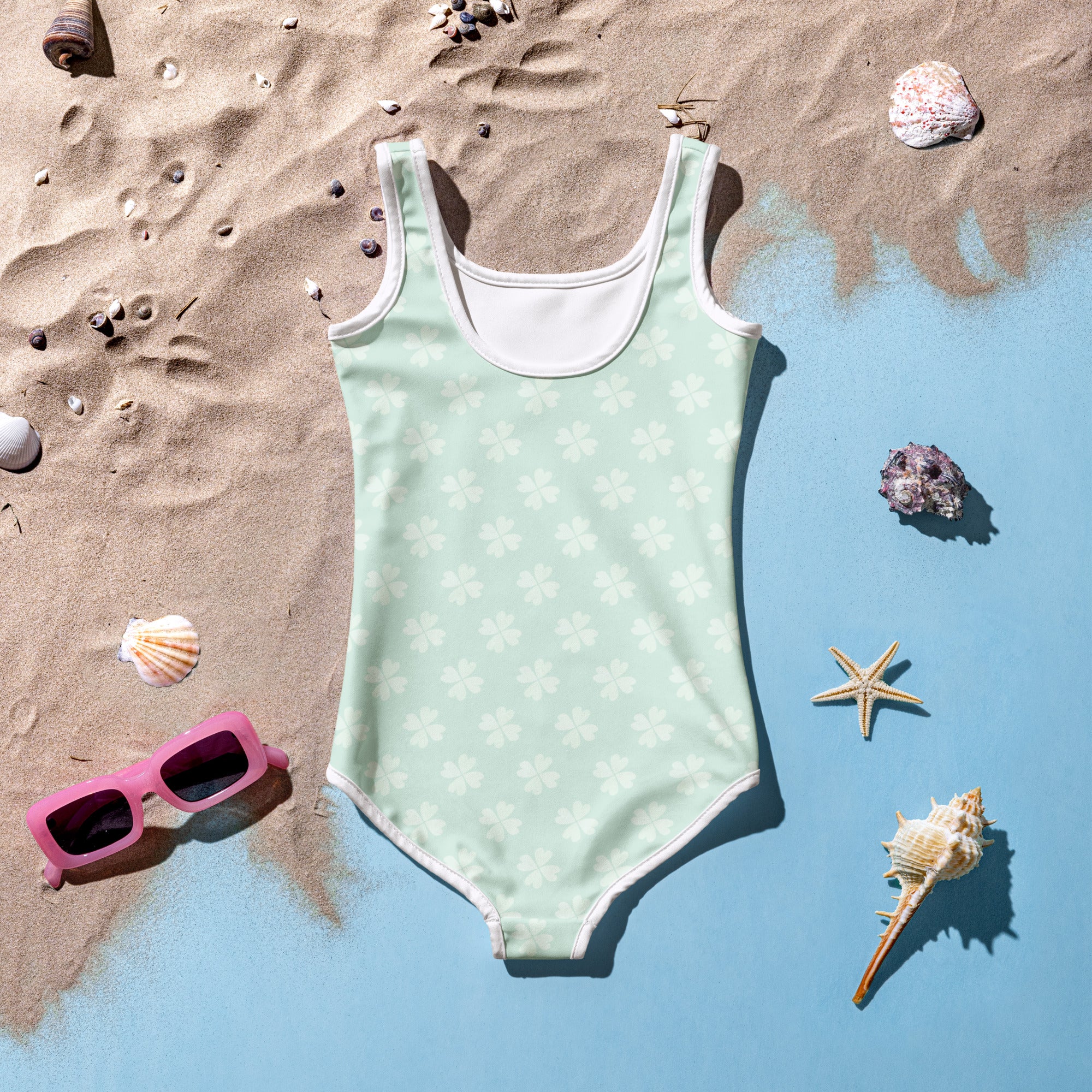 Girls mint shamrock buttery soft one-piece swimsuit with white floral pattern and upf 50 plus double layered front