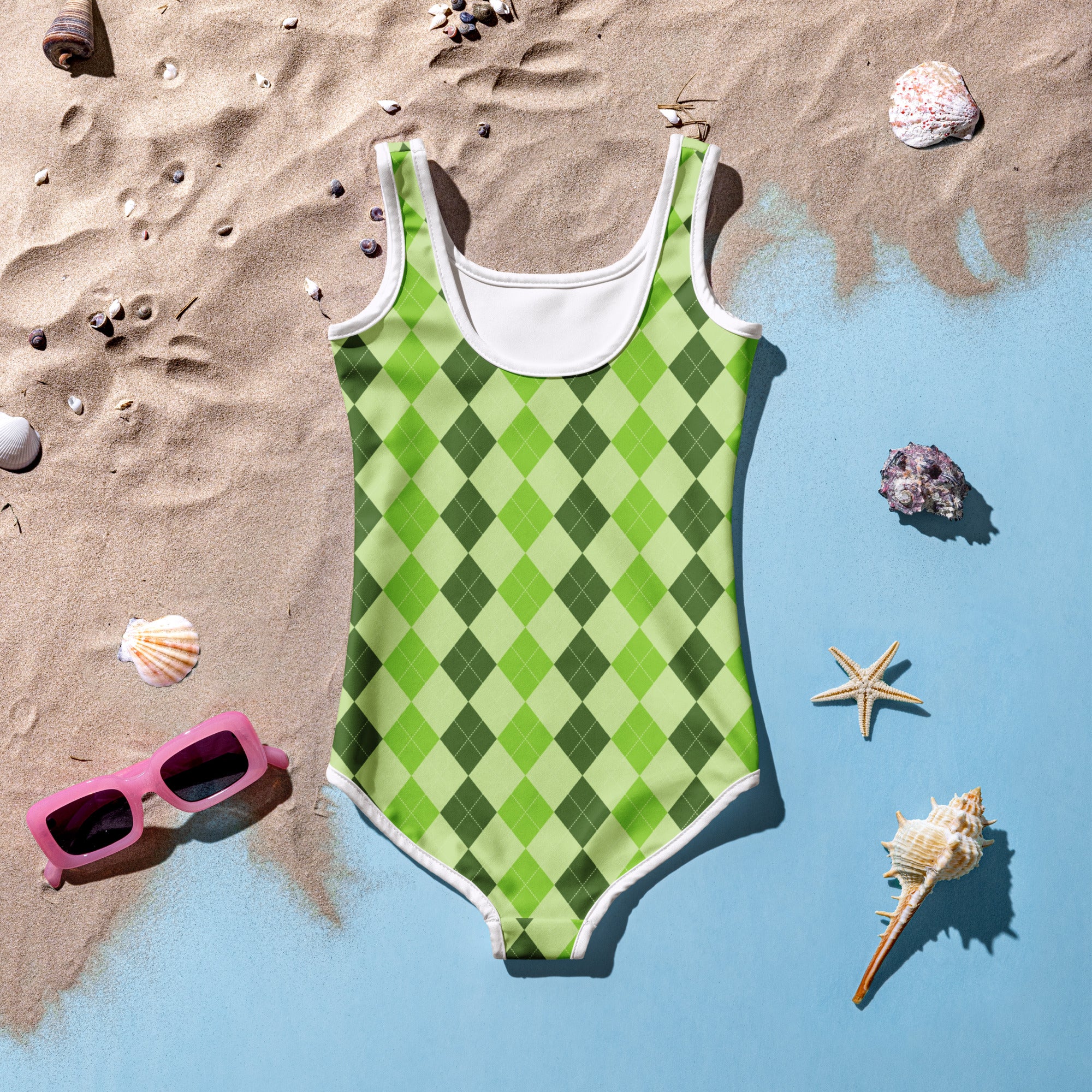 A vibrant green argyle girls one-piece swimsuit with white trim, buttery soft fabric, and UPF 50+ protection