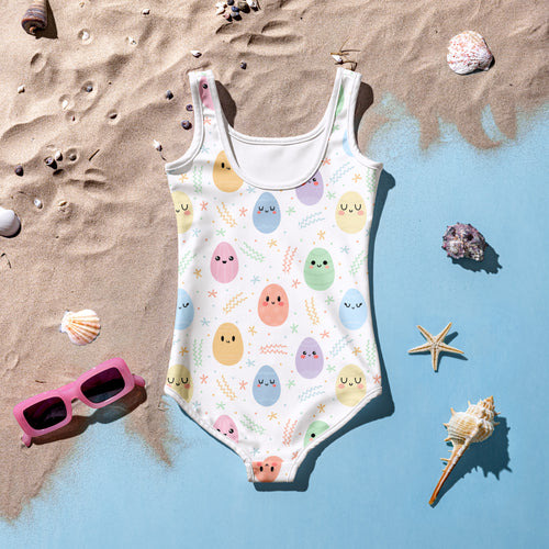 Girls easter egg buttery soft white one-piece swimsuit with pastel egg pattern green sprigs upf 50 plus double layered front