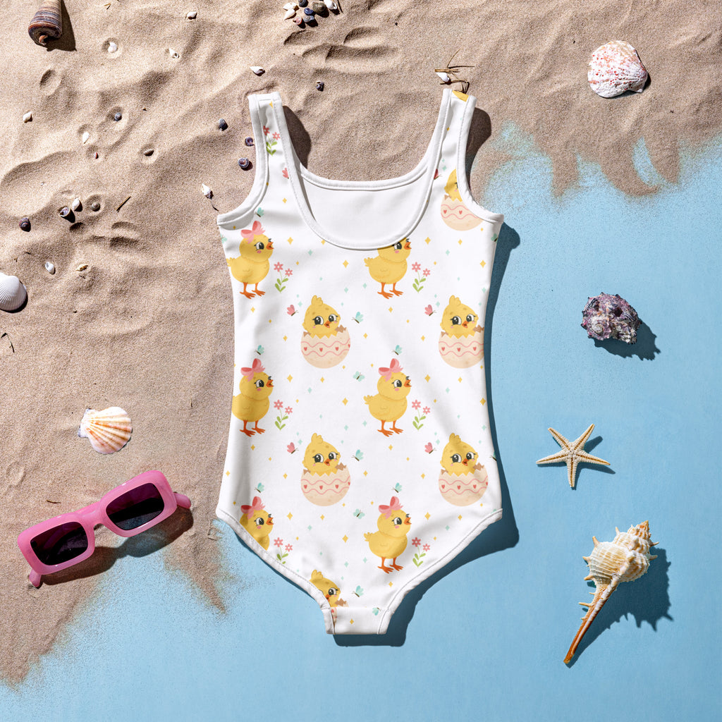 White girls one-piece swimsuit with playful yellow chicks pink bows and pastel flowers buttery soft UPF 50+ double layered front