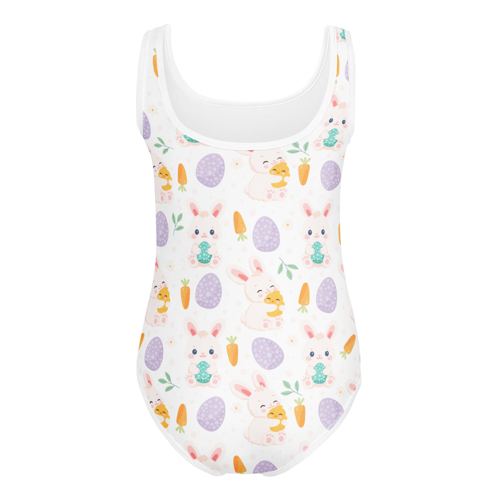 White one-piece quick drying leotard for girls featuring pastel purple eggs pink bunnies and green egg treats for easter