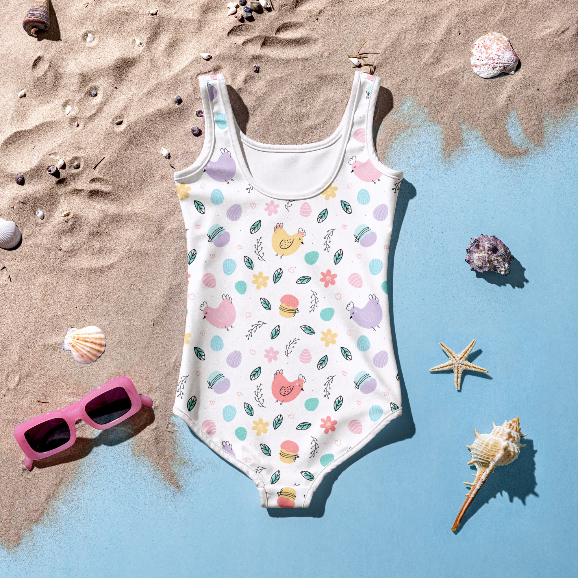 White one-piece girls swimsuit with pastel chick egg flower print buttery soft fabric upf 50 plus double layered front