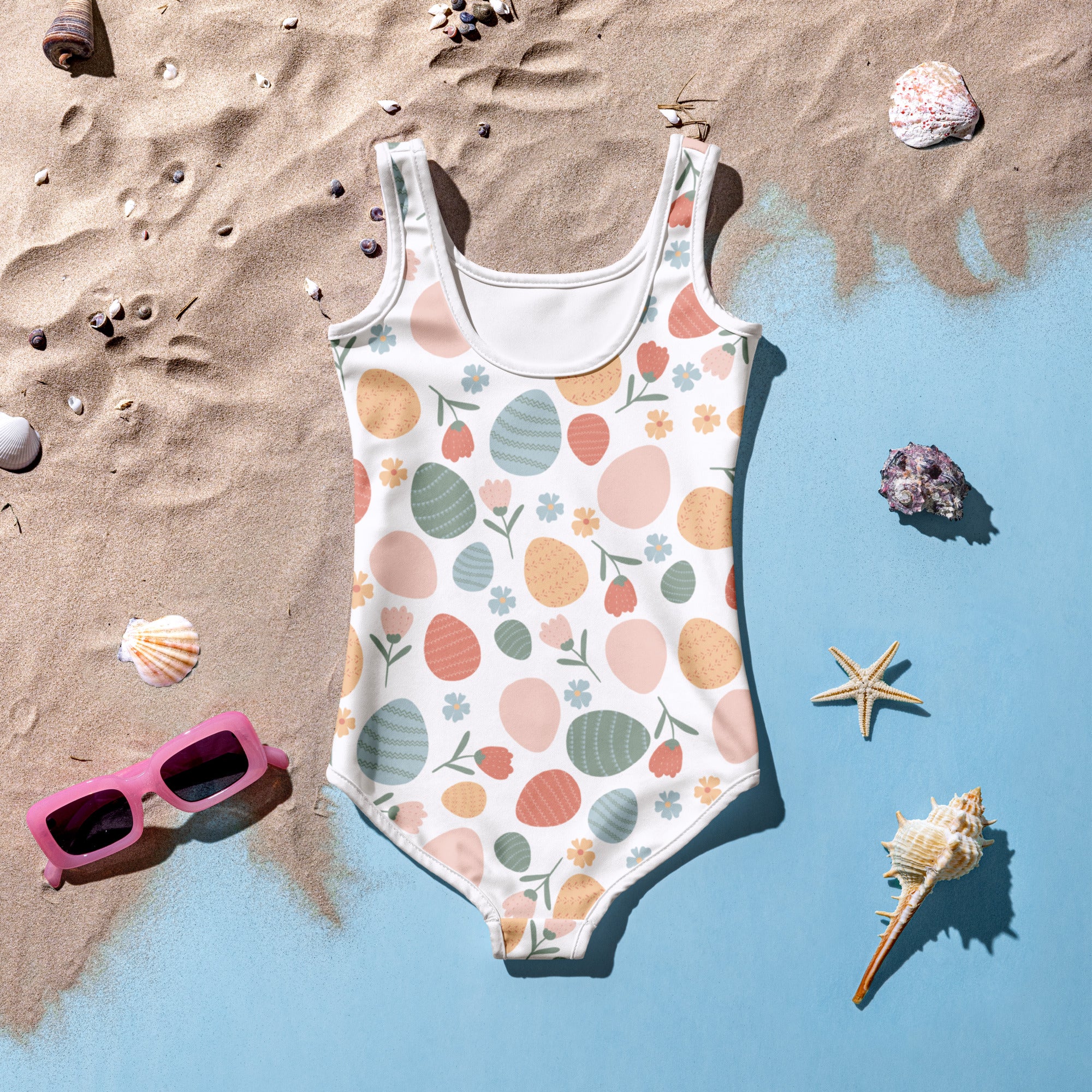 Girls pastel Easter egg pattern buttery soft white swimsuit with UPF 50+ and double layered front details