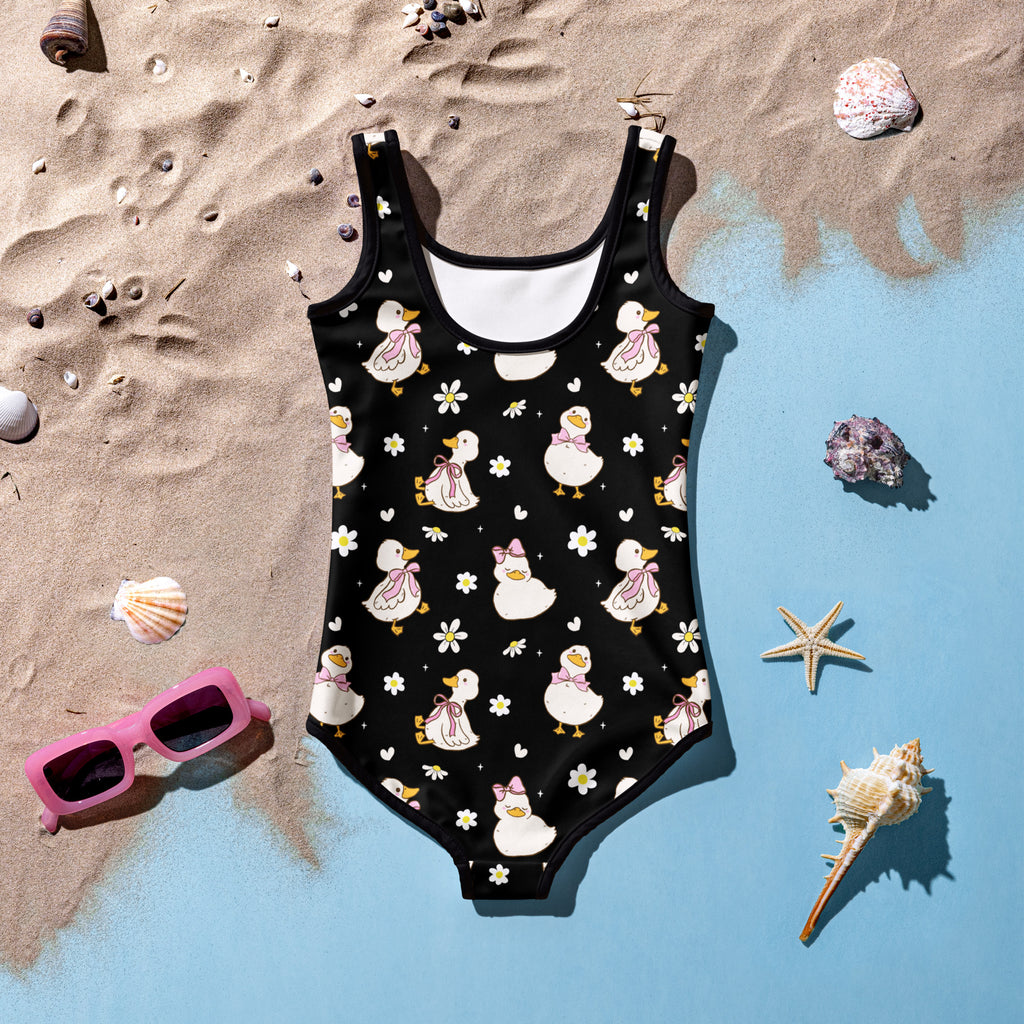 Black girls one-piece swimsuit with white ducks wearing pink bows and daisies buttery soft upf 50 plus double layered front