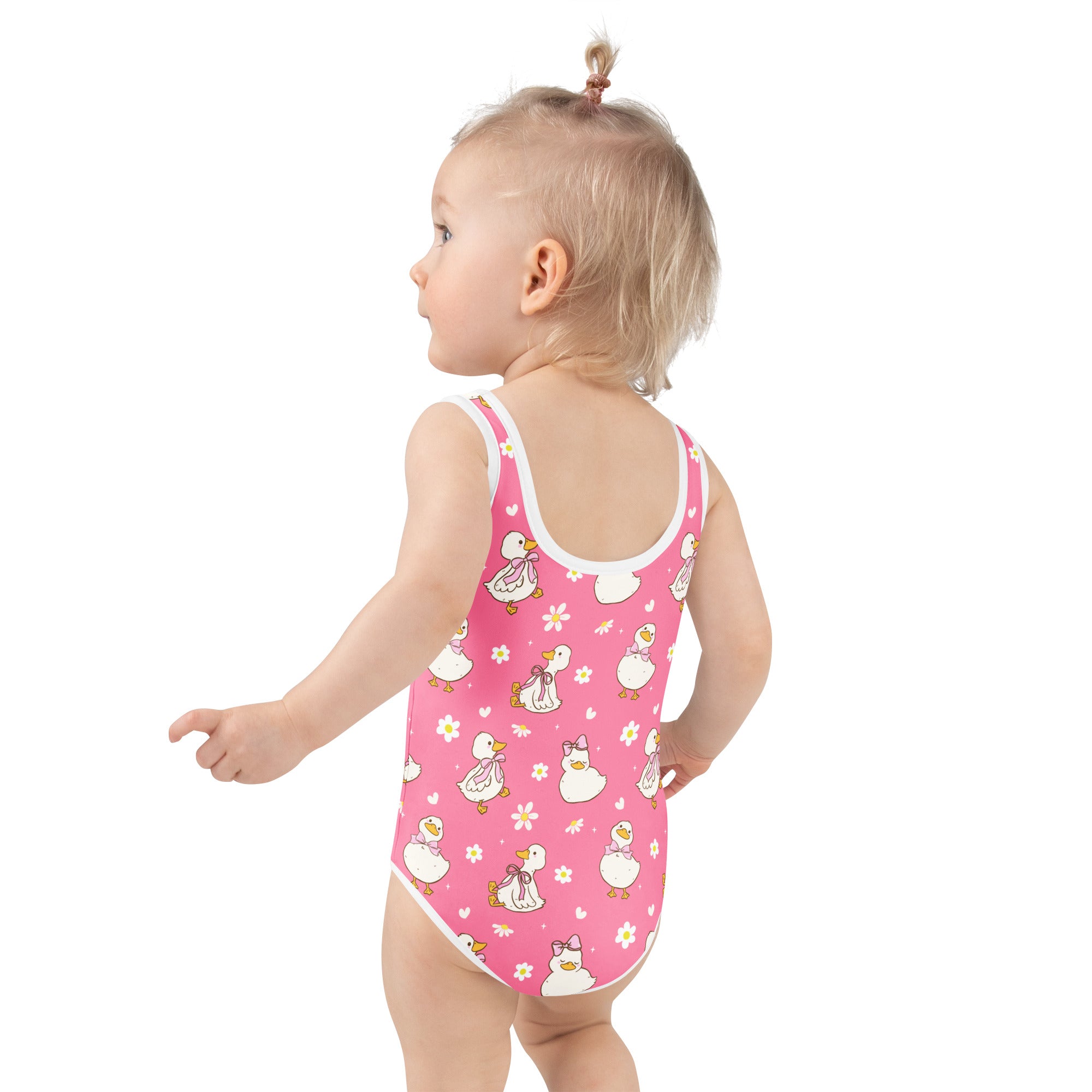 Girls pink duck and daisy buttery soft swimsuit with white trim double layered front and upf 50 plus protection