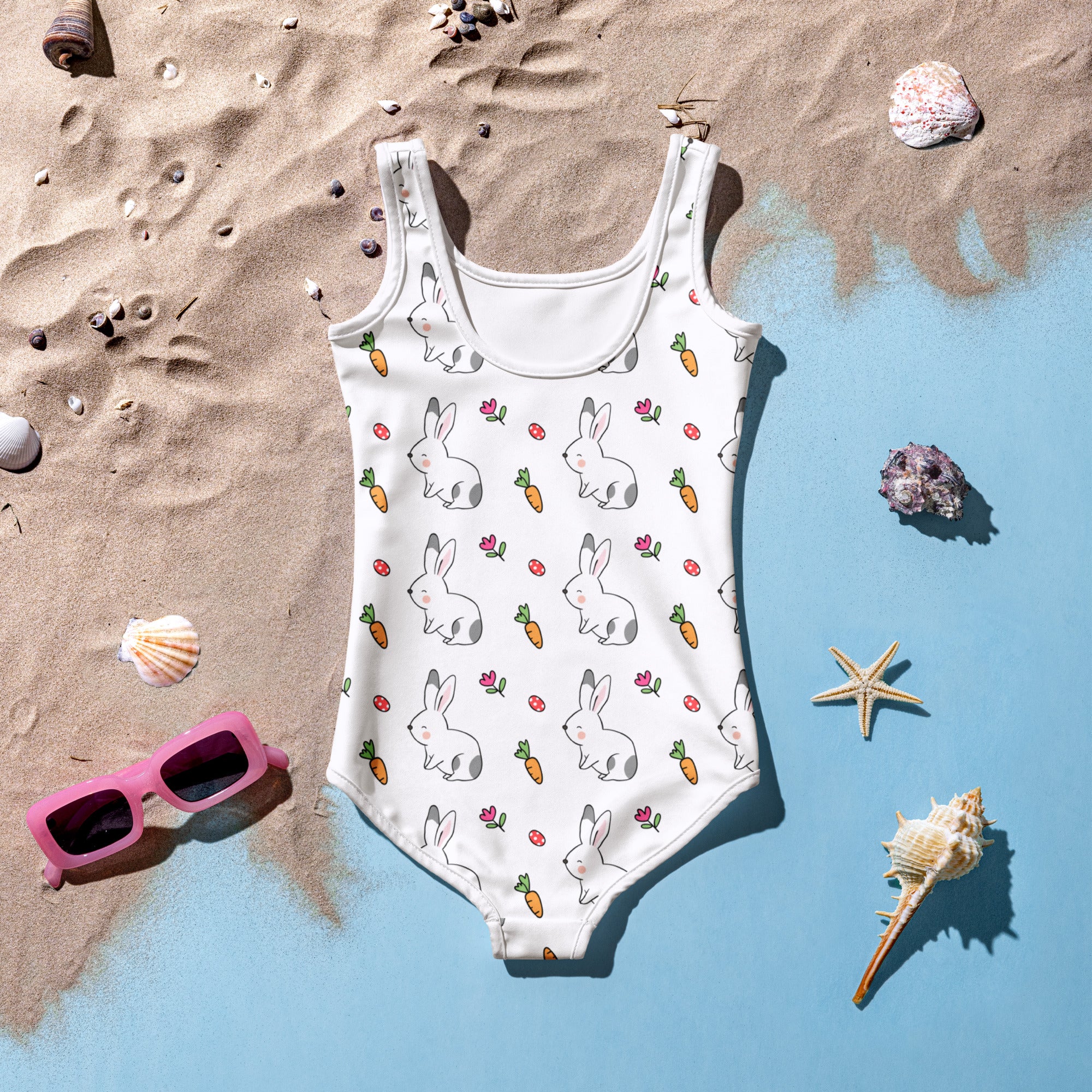 White girls bunny and carrot Easter one-piece swimsuit with playful pattern and UPF 50 plus double layered front