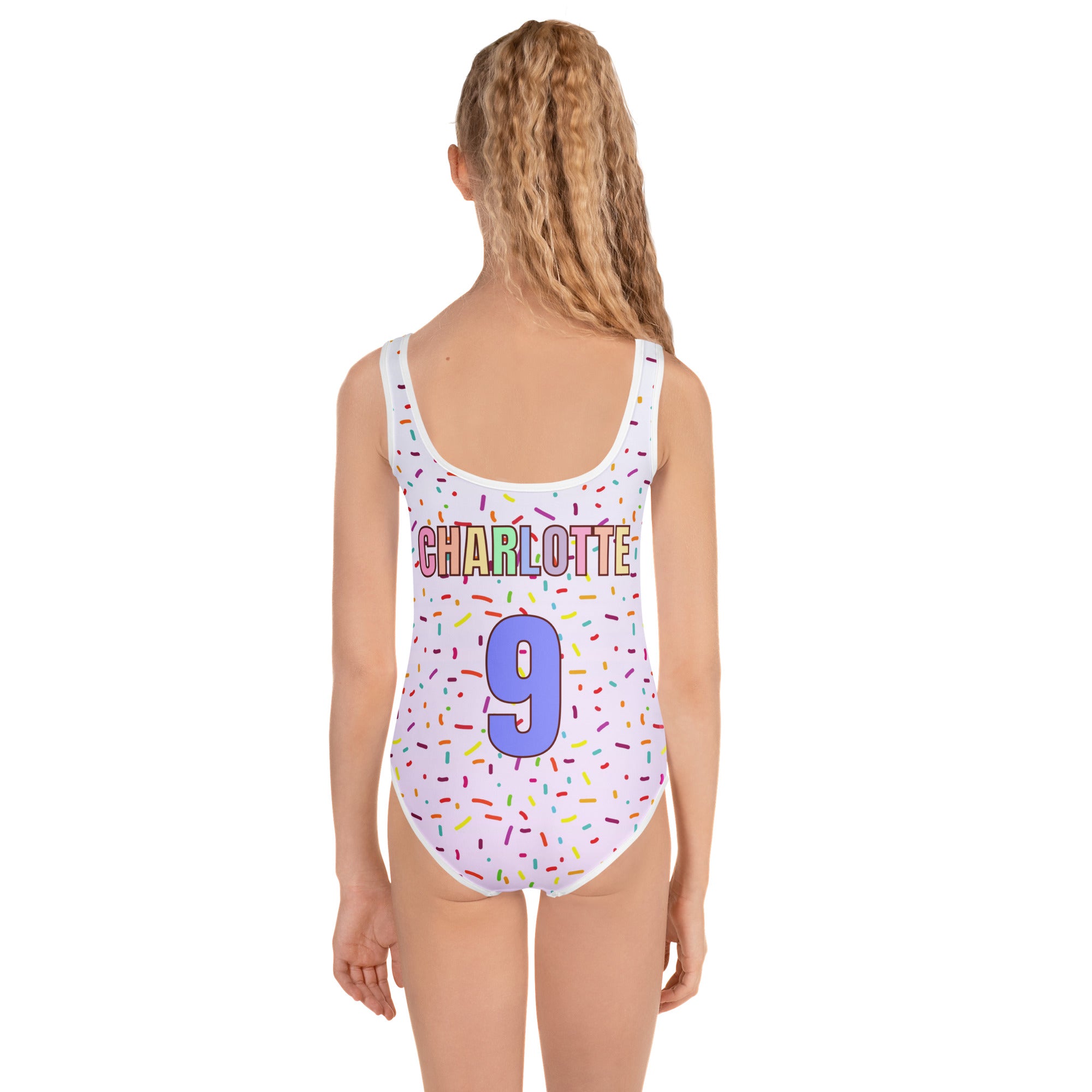 One-piece swimsuit with colorful design and text on a white background