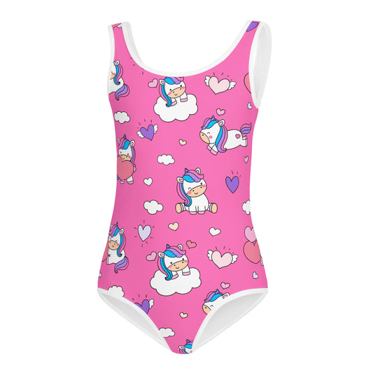 A pink girls' leotard with a pattern of white hearts, unicorns, and clouds.