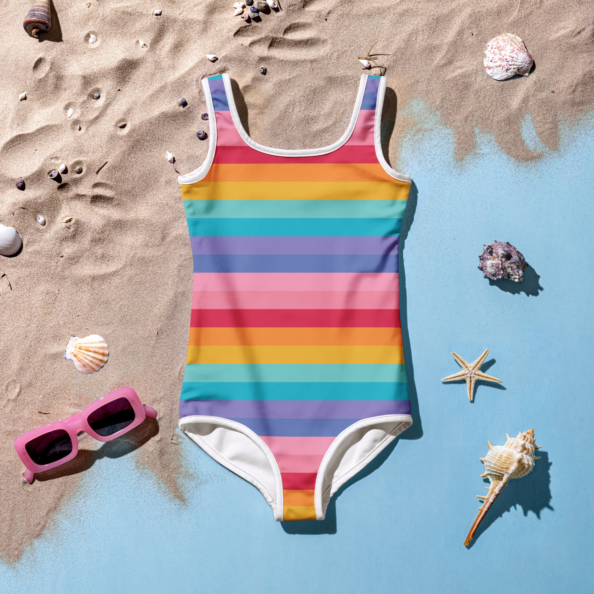 Girls bright rainbow striped buttery soft one-piece swimsuit with white trim and upf 50 plus sun protection