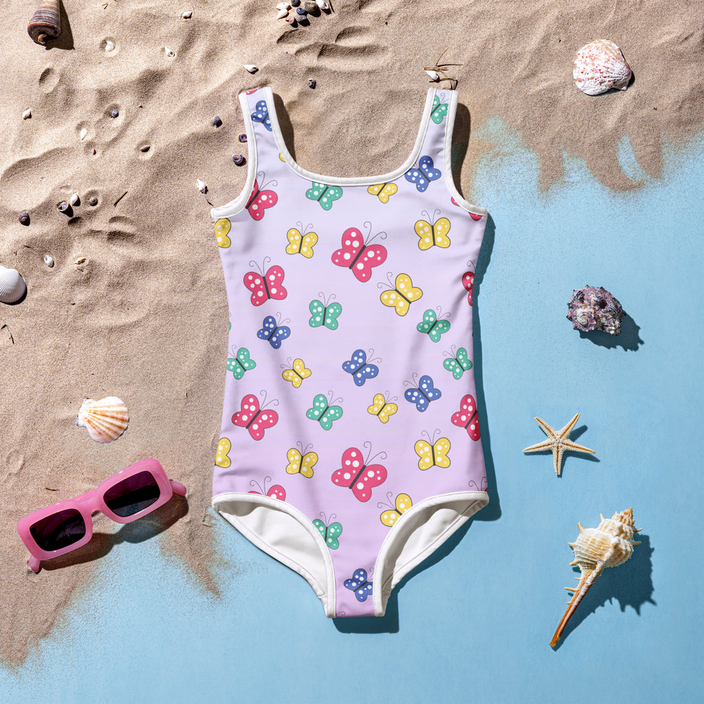 A pastel lavender girls one-piece swimsuit with colorful butterfly pattern and UPF 50 plus sun protection