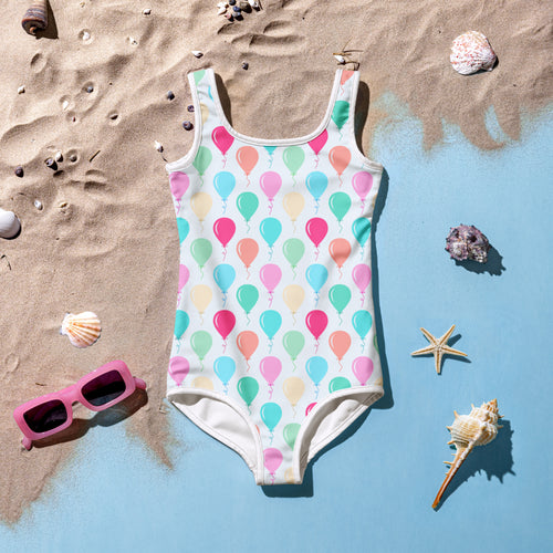 Girls birthday balloons buttery soft white one-piece swimsuit with pastel balloon pattern and UPF 50 plus sun protection