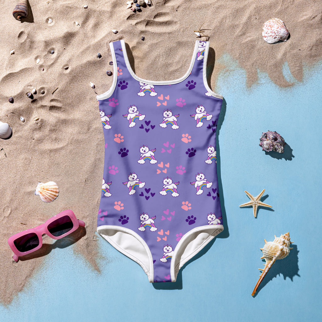 Girls purple buttery soft one-piece swimsuit with white trim featuring cartoon dogs rainbows and upf 50+ protection