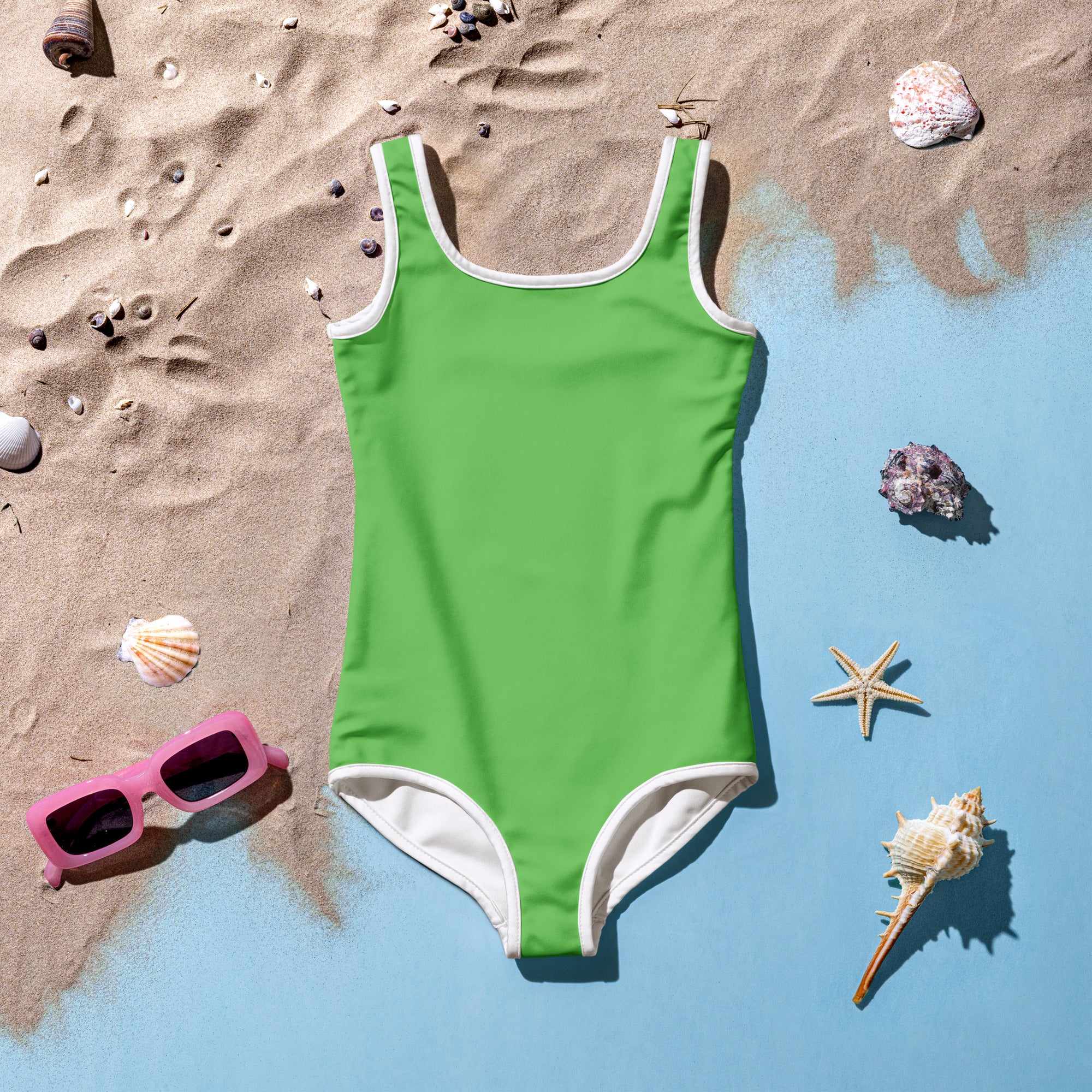 A vibrant lime green one-piece swimsuit with white trim designed for girls with UPF 50 plus sun protection