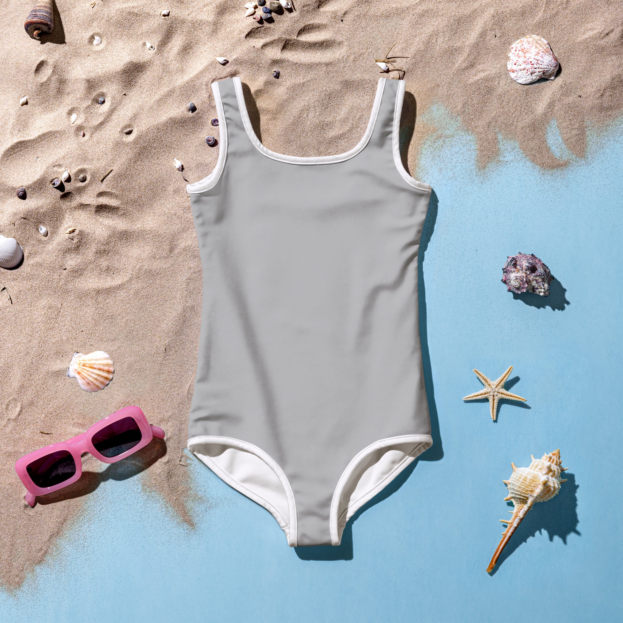 Girls silver buttery soft one-piece swimsuit in solid gray with white trim and UPF 50 plus sun protection