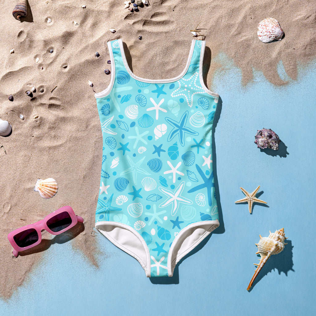 Light blue girls one-piece swimsuit with white trim starfish seashell pattern buttery soft fabric upf 50 plus protection