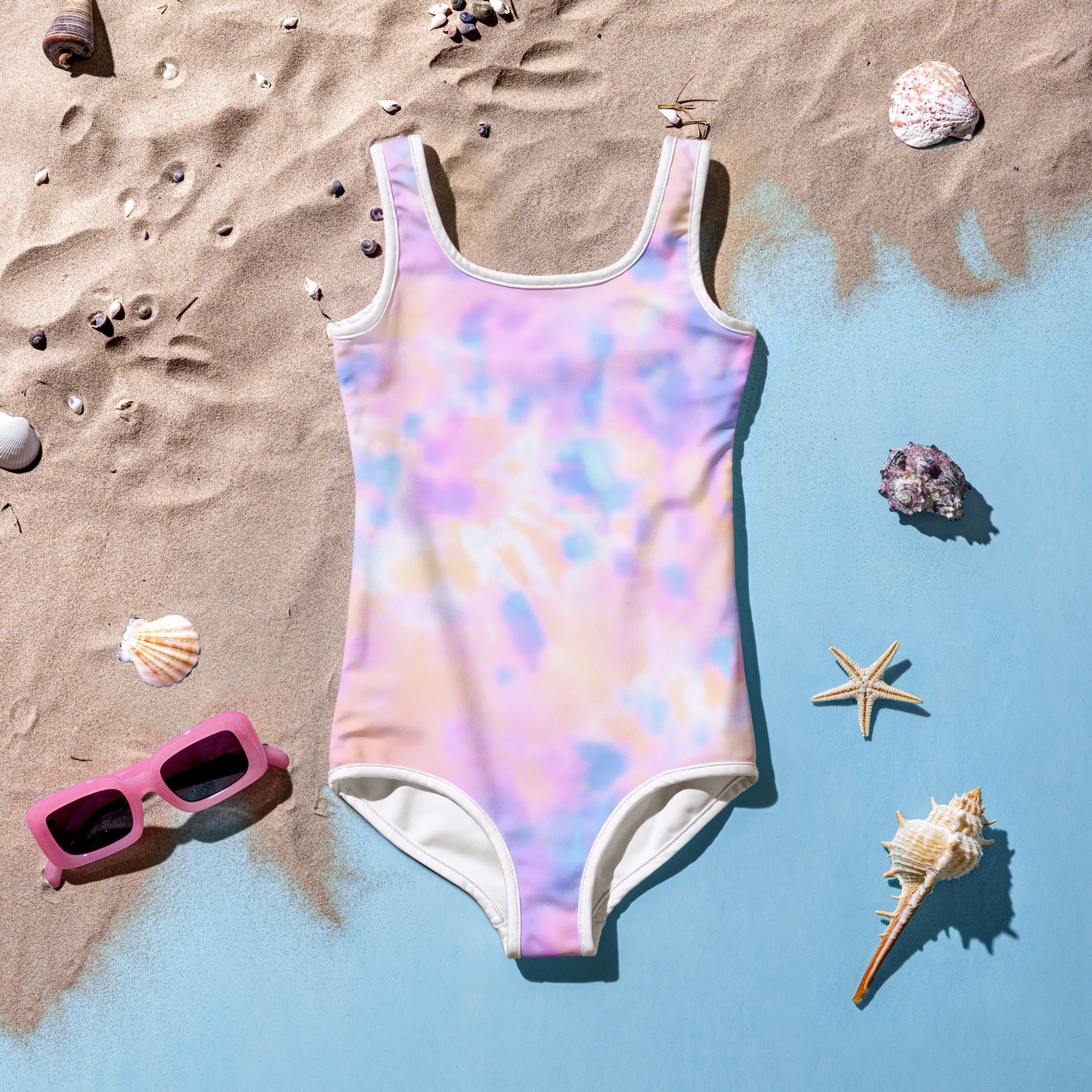 Girls pastel watercolor tie-dye one-piece swimsuit with white trim buttery soft fabric and UPF 50 plus protection