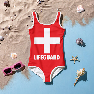 Girls lifeguard buttery soft red one-piece swimsuit with white cross, lifeguard text, white trim, and upf 50 plus protection