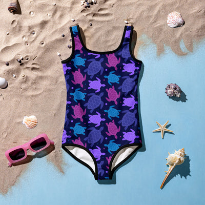 Girls purple sea turtle buttery soft navy blue one-piece swimsuit with upf 50 plus and black trim accents