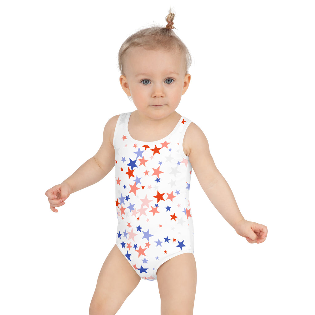 White girls one-piece swimsuit with red blue and pink star pattern for 4th of July celebrations