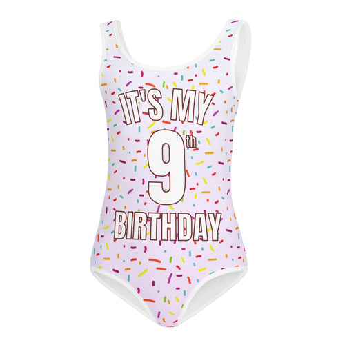 White one-piece swimsuit with colorful sprinkle pattern and its my 9th birthday text for girls dance and gymnastics