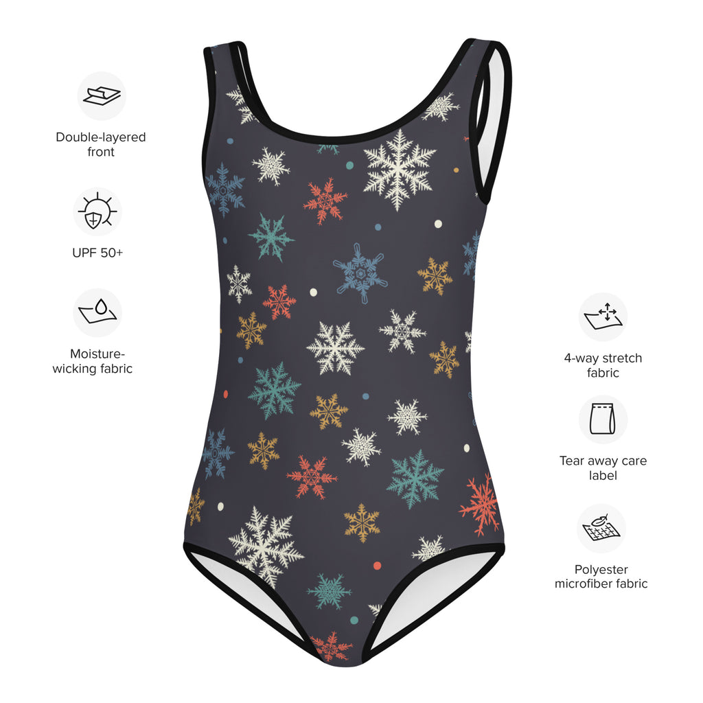 Dark gray girls one-piece swimsuit with colorful white teal orange and gold snowflake pattern buttery soft fabric