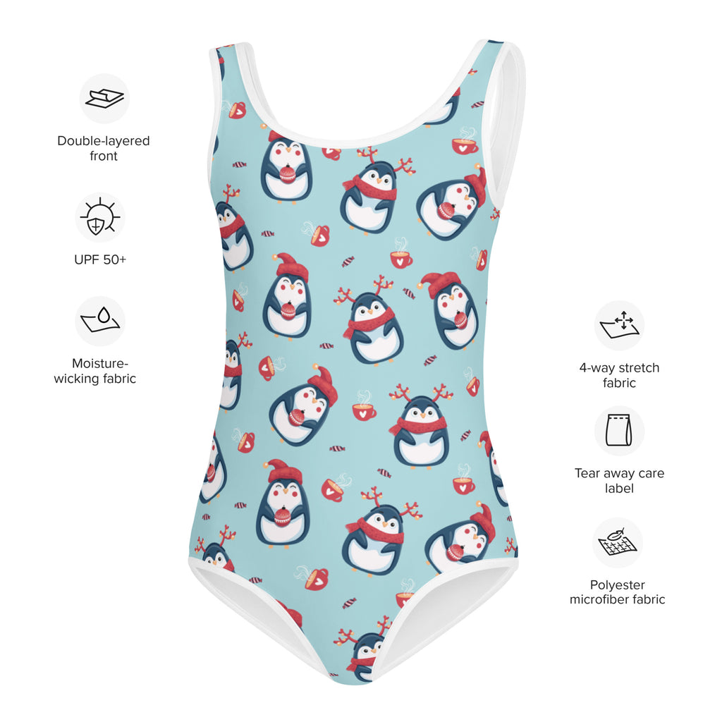 A light blue girls buttery soft one-piece swimsuit with cartoon penguins and white trim for Christmas use