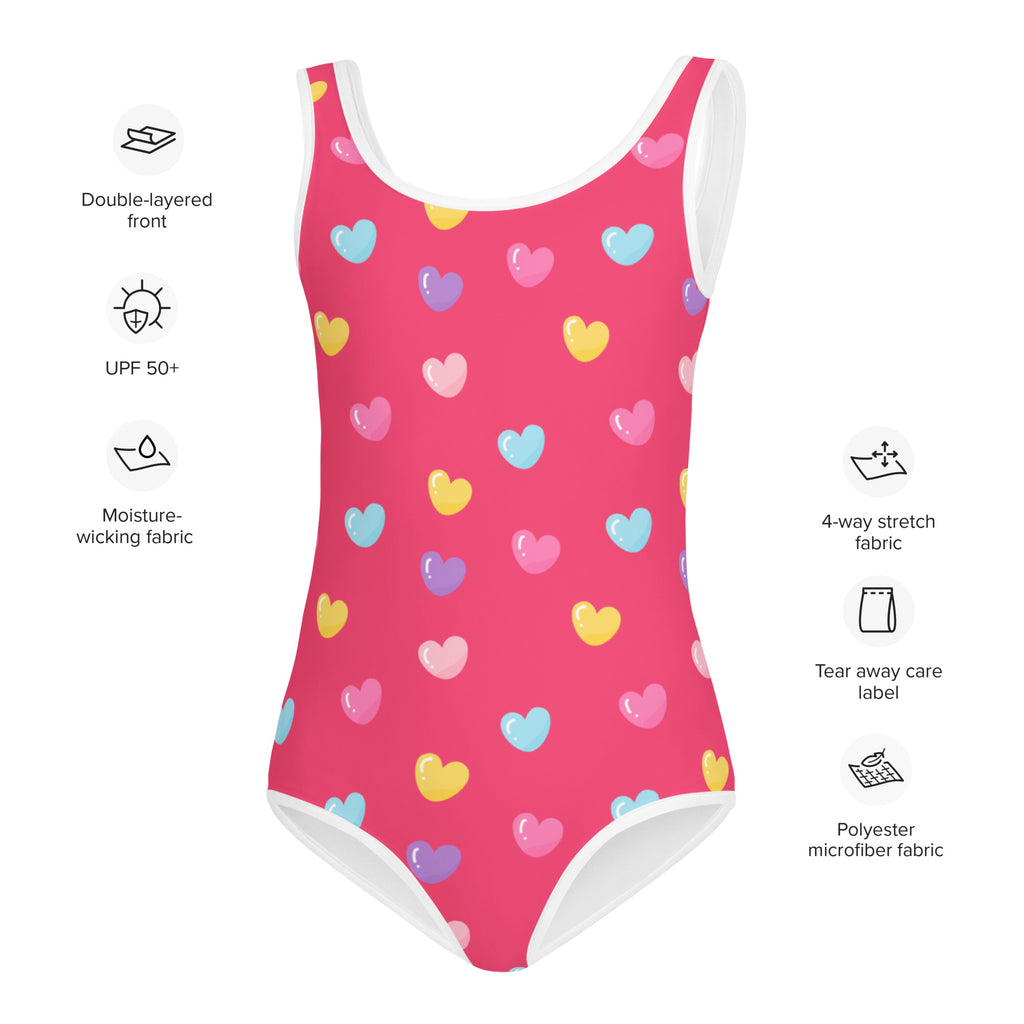 A girls colorful hearts pink buttery soft one-piece swimsuit with multicolored heart pattern and UPF 50 plus protection