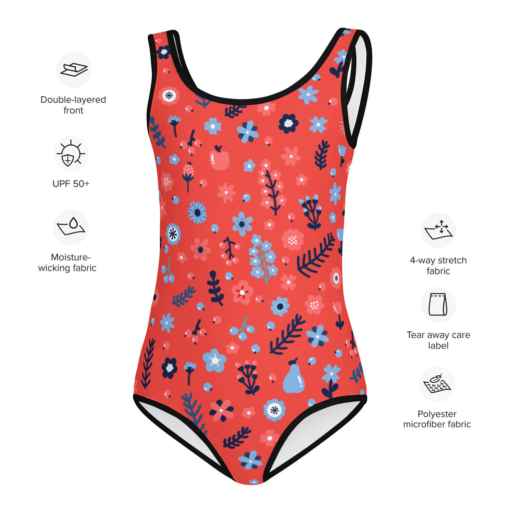 A vibrant coral girls one-piece swimsuit with playful blue pink navy floral pattern black trim buttery soft fabric upf 50+