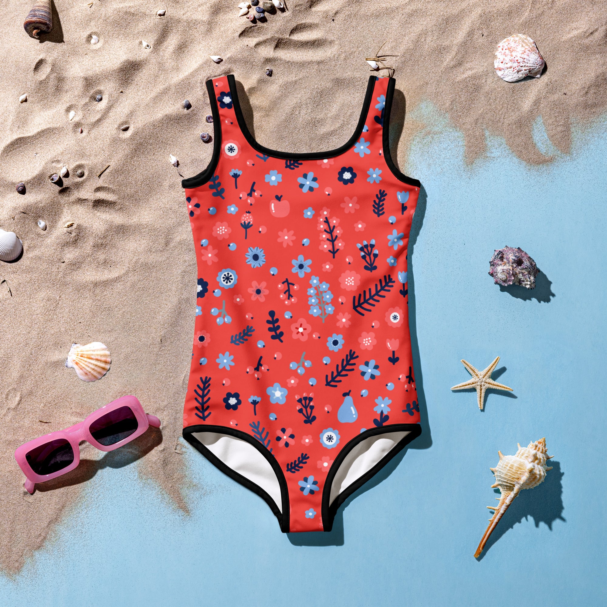 A vibrant coral girls floral one-piece swimsuit with buttery soft fabric and upf 50 plus protection