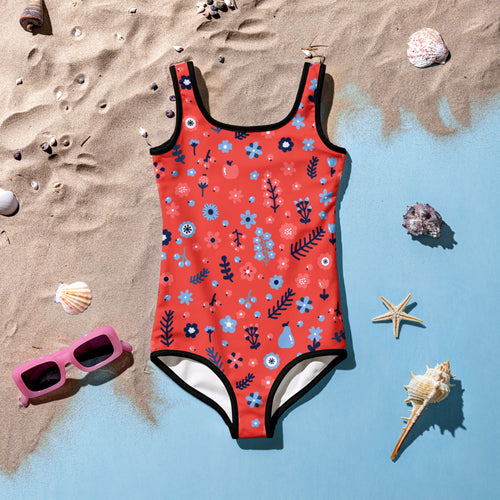 A vibrant coral girls floral one-piece swimsuit with buttery soft fabric and upf 50 plus protection