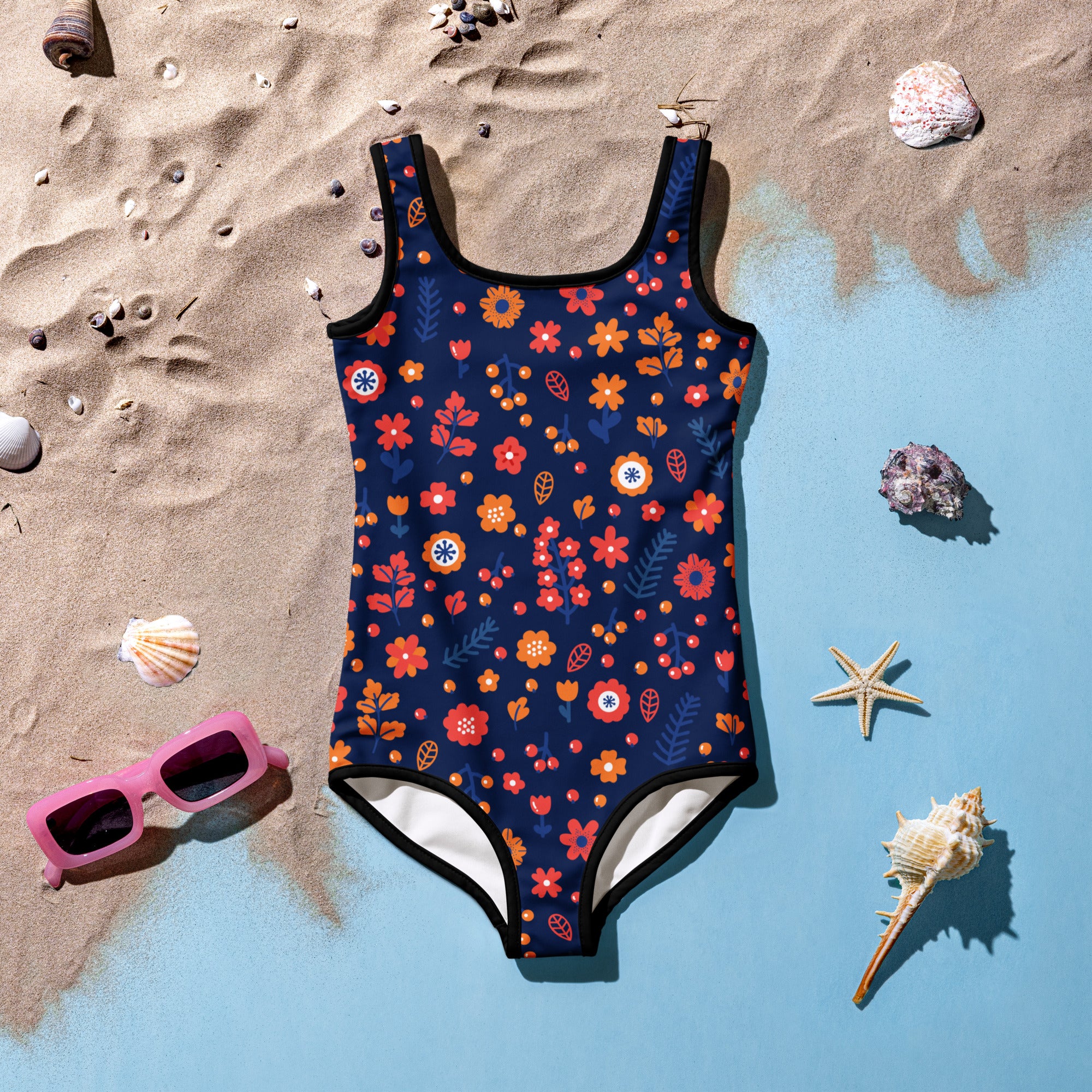Girls floral blue buttery soft one-piece swimsuit with vibrant orange red white flowers black trim and UPF 50 plus protection