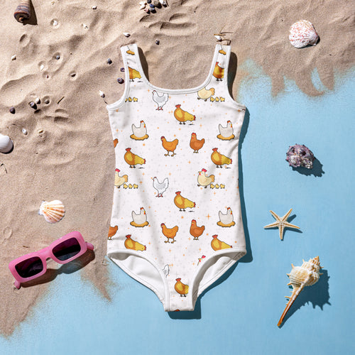 Girls white one-piece swimsuit with playful yellow orange chicken pattern buttery soft fabric and upf 50+ protection