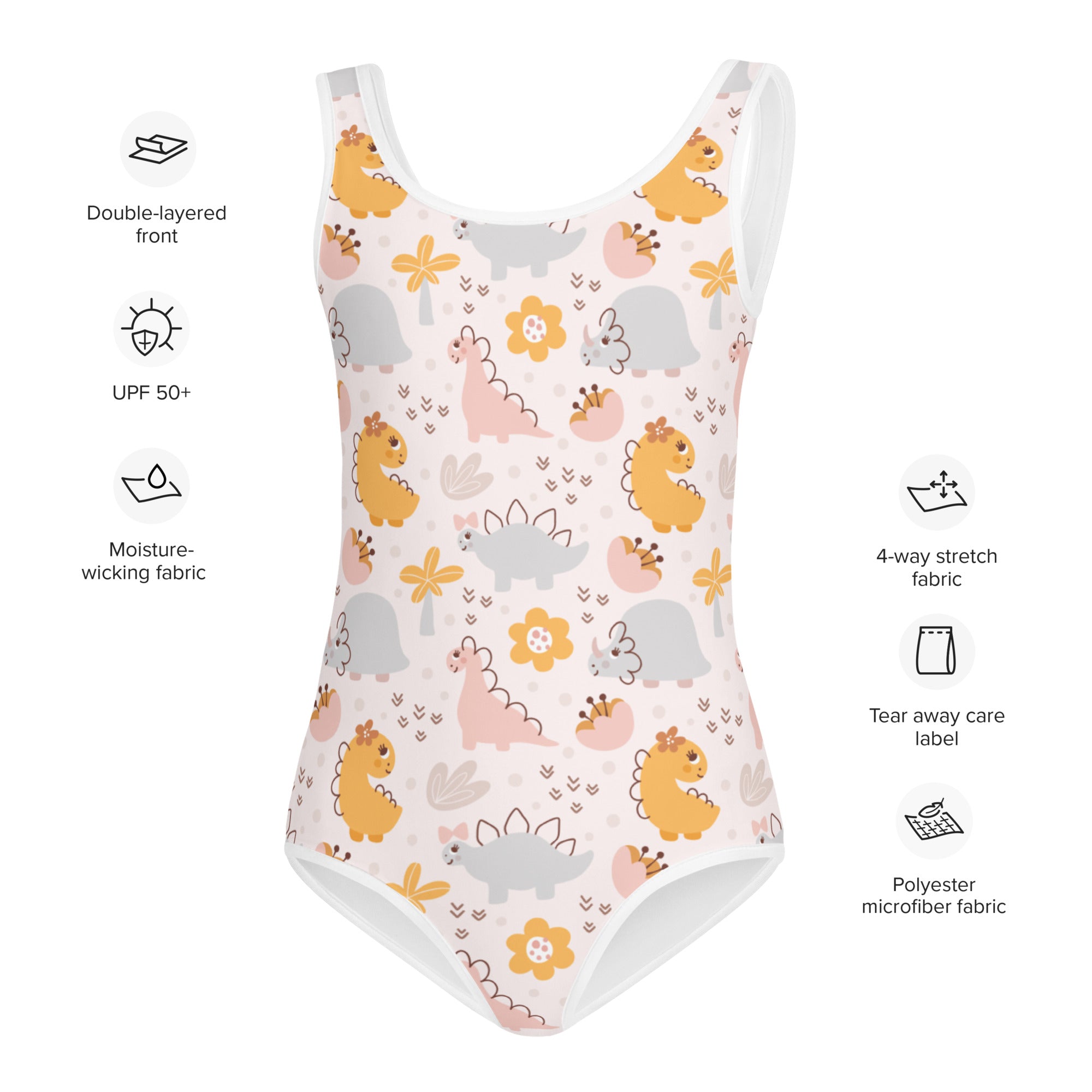 White one-piece girls swimsuit with playful yellow pink gray cartoon dinosaurs and floral accents buttery soft upf 50+