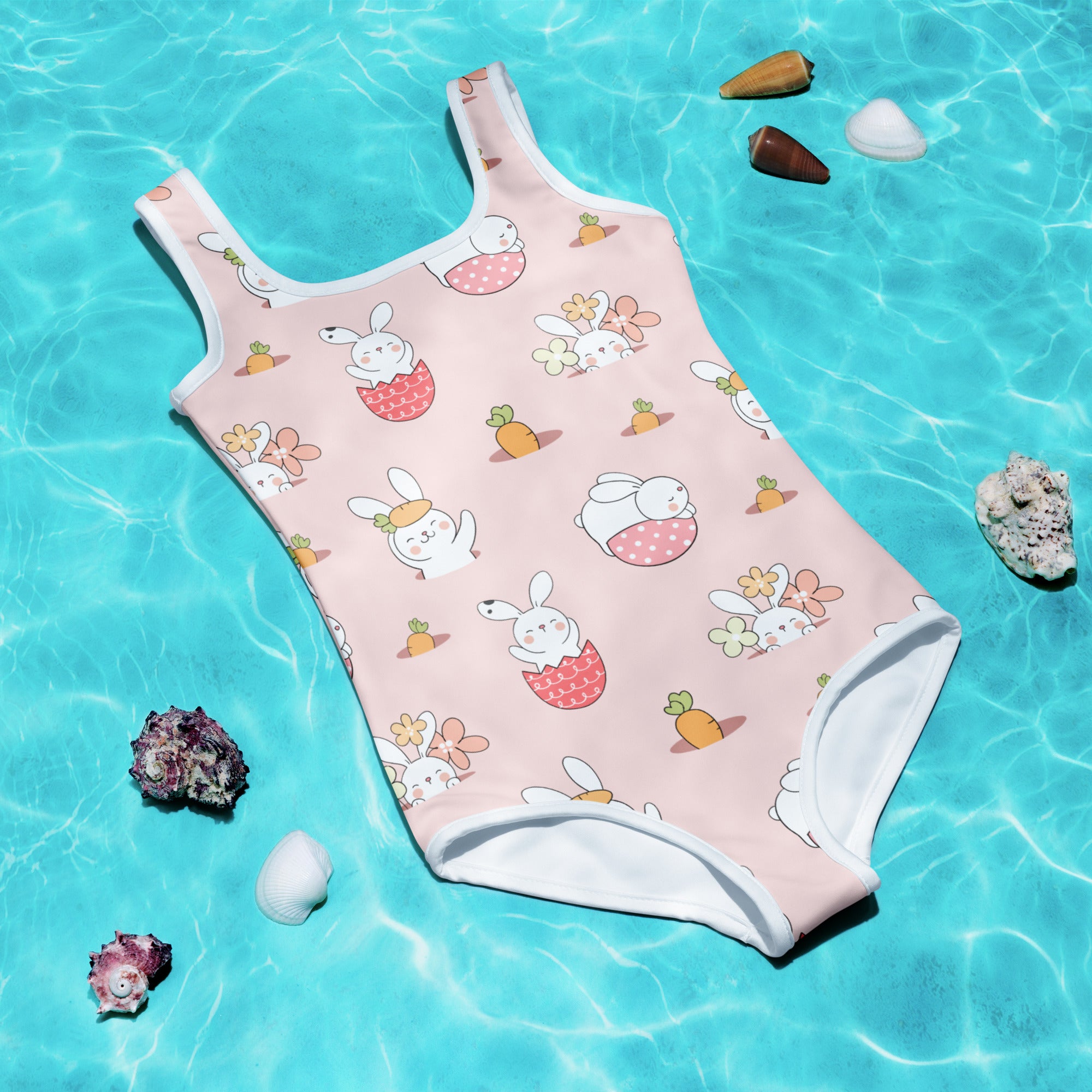 Girls Easter bunny pattern buttery soft pink one-piece swimsuit with UPF 50 plus featuring cartoon bunnies carrots and flowers