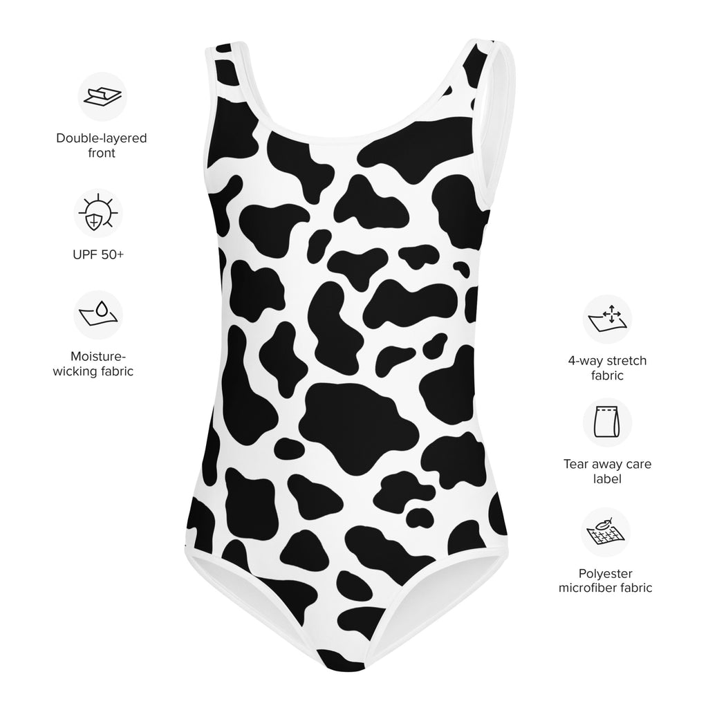 Girls cow buttery soft white one-piece swimsuit with black cow print pattern and UPF 50 plus protection