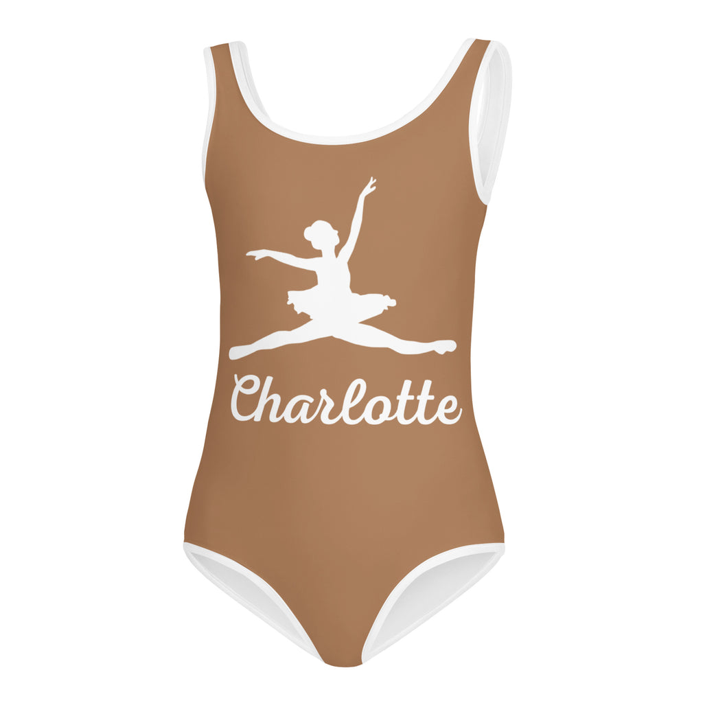 A tan buttery soft quick drying girls one-piece swimsuit with white trim ballet dancer print and custom name Charlotte