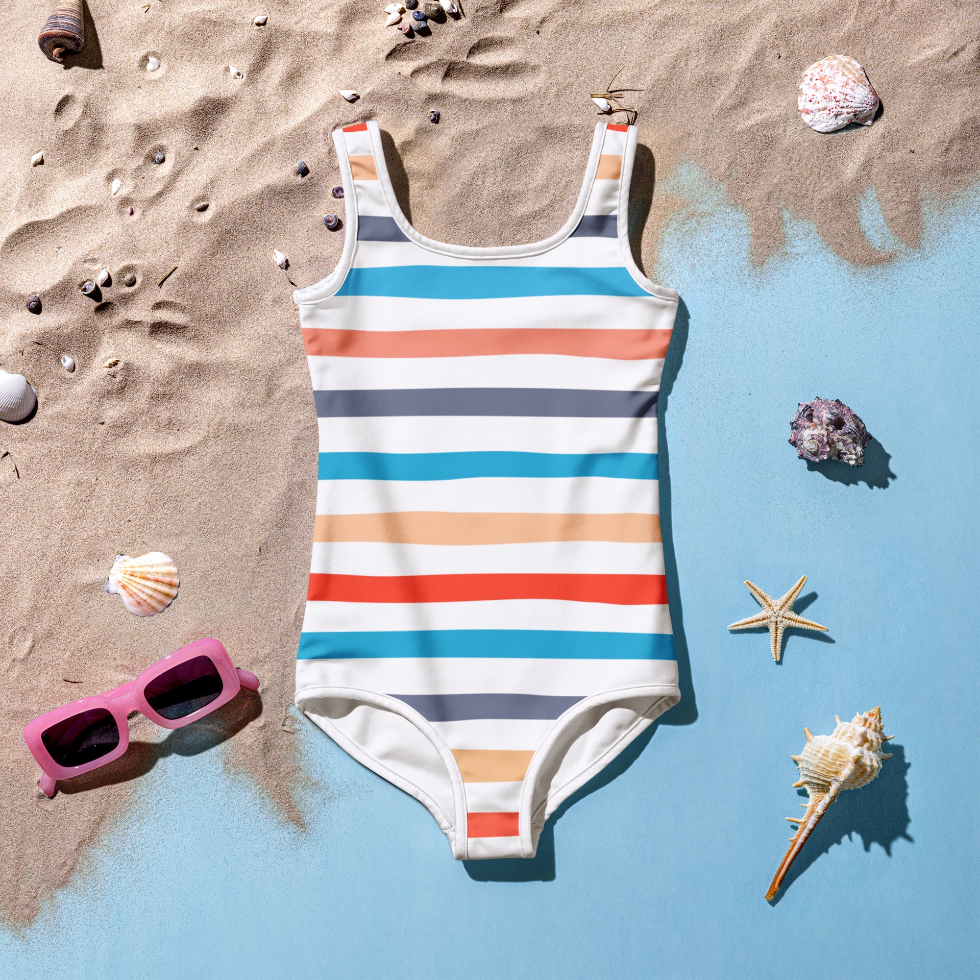 A girls coastal stripes buttery soft one-piece swimsuit with horizontal white coral teal gray stripes and UPF 50+ protection