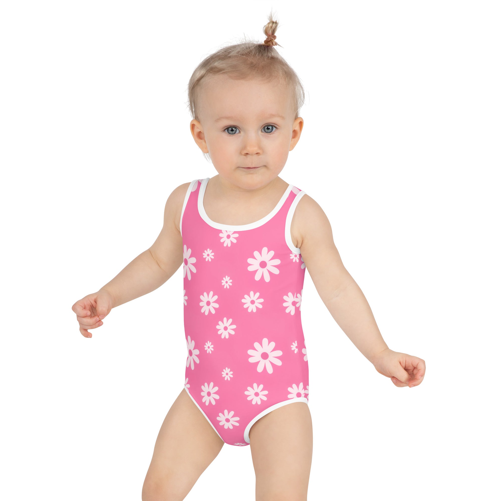 Girls pink daisy buttery soft one-piece swimsuit with white trim and UPF 50 plus sun protection