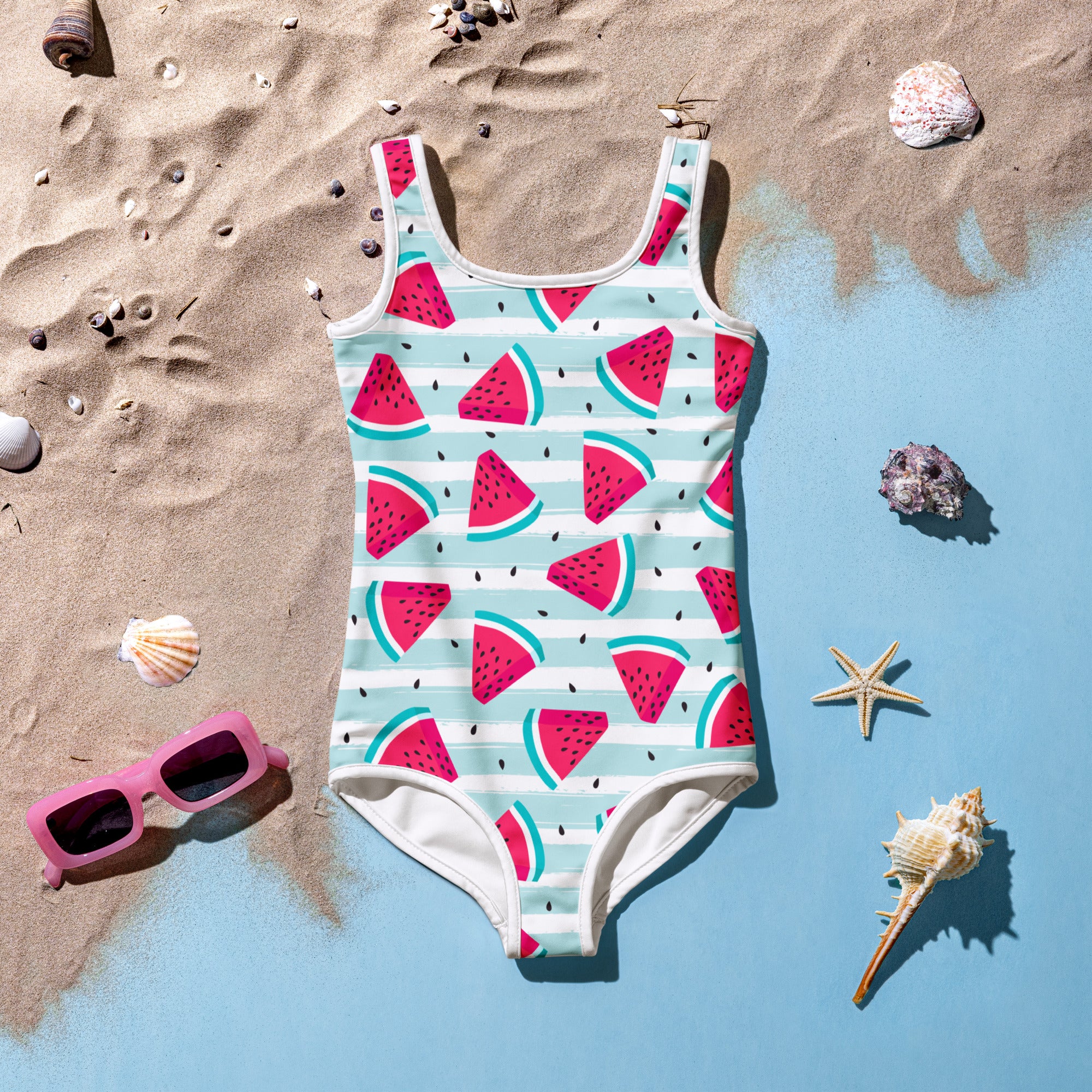A vibrant girls striped watermelon one-piece swimsuit with mint green and white stripes on buttery soft fabric with UPF 50+