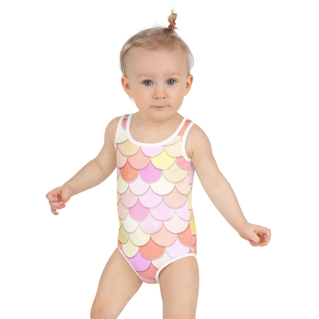 Girls pink and orange pastel mermaid scale print one-piece swimsuit with white trim and UPF 50 plus buttery soft fabric