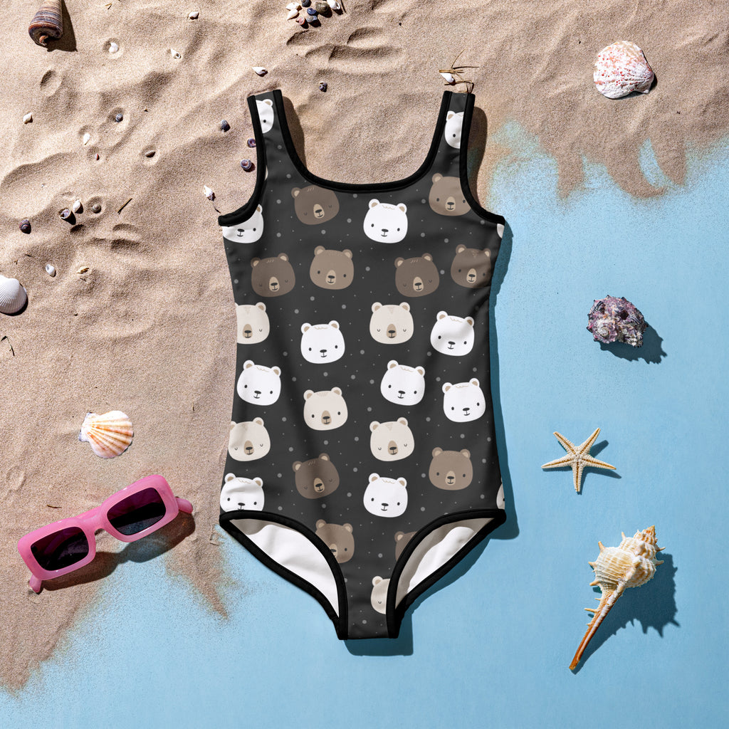 Girls bear face buttery soft black one-piece swimsuit with white and brown cartoon bear faces and UPF 50+ protection