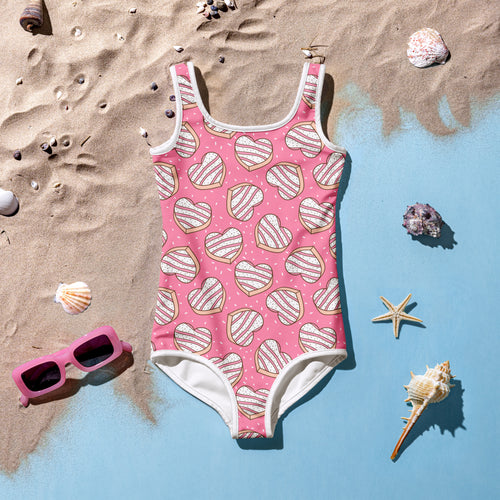 Girls heart cookies and sprinkles buttery soft pink one-piece swimsuit with heart cookie pattern and white trim upf 50+