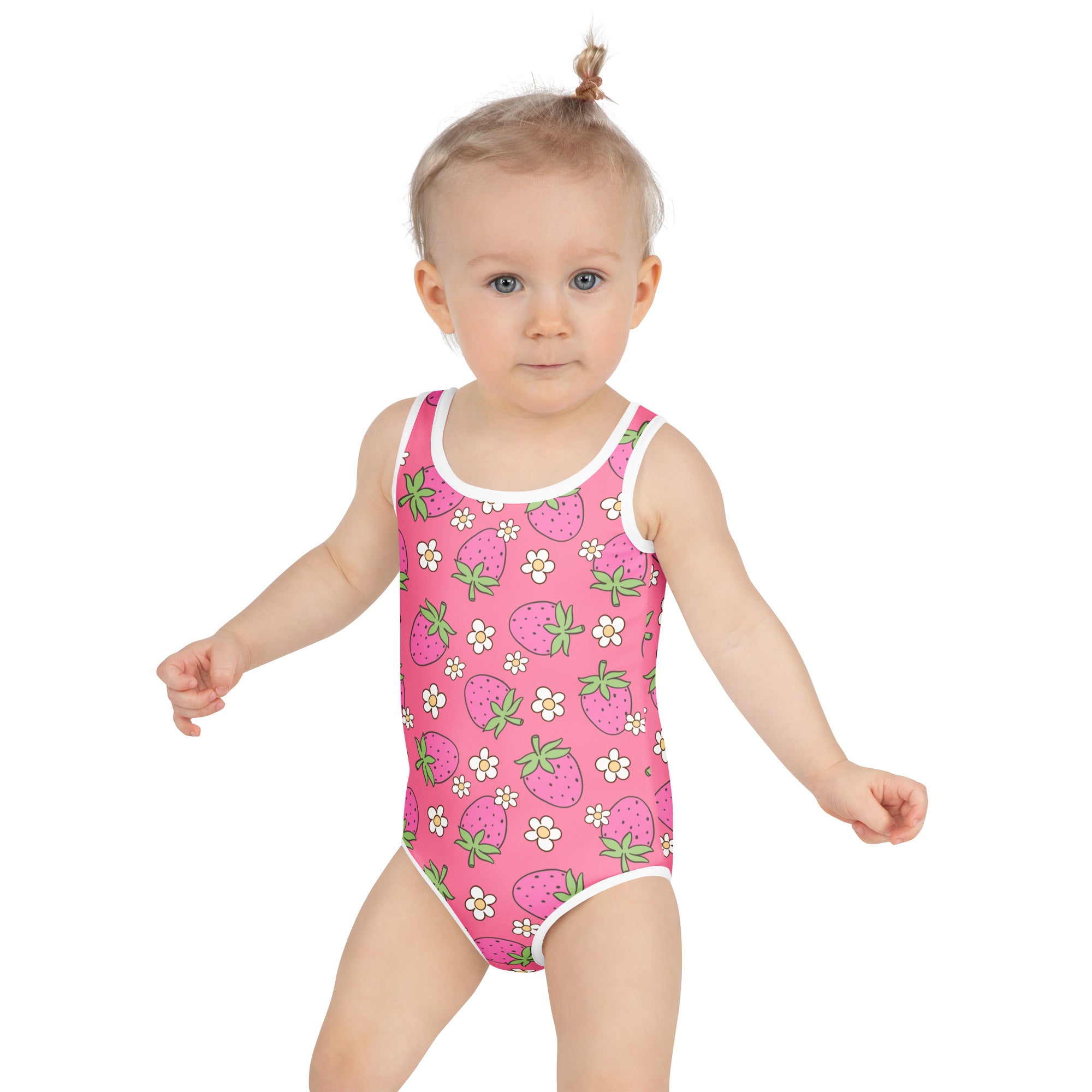Girls pink strawberry and white flower patterned buttery soft one-piece swimsuit with white trim and UPF 50 plus protection