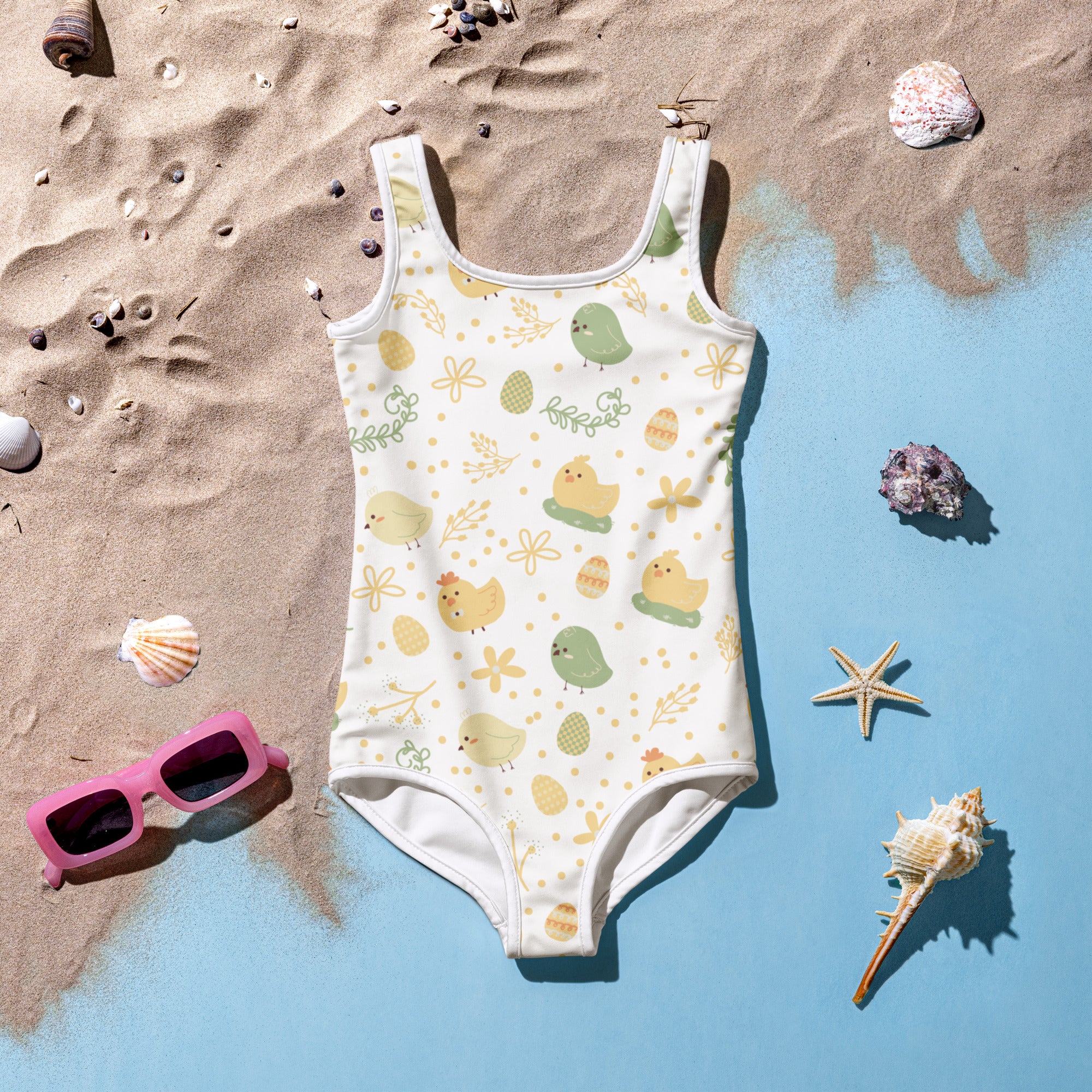 Girls pastel birds buttery soft white swimsuit with yellow green chick pattern and upf 50 plus sun protection