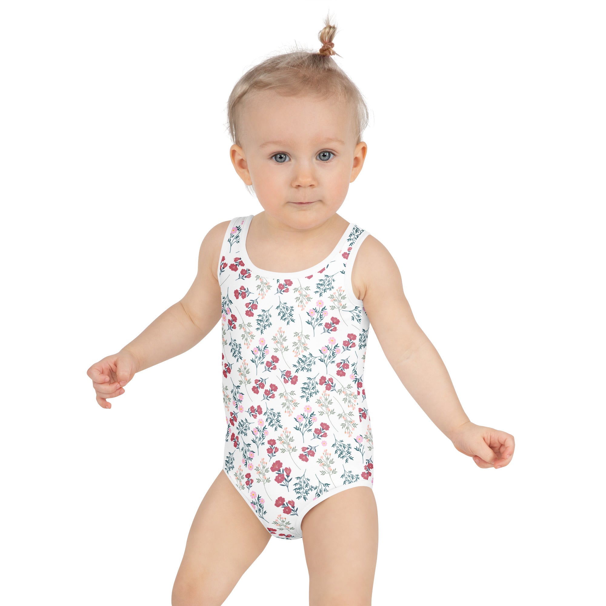 White girls wildflower meadow one-piece swimsuit with delicate pink and green floral pattern and upf 50+ protection