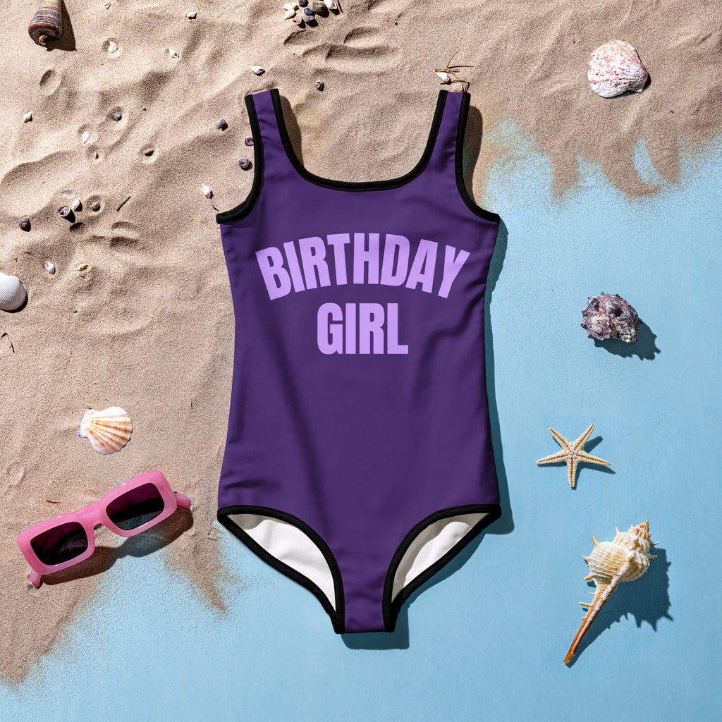 Girls purple birthday girl one-piece swimsuit with black trim white lining and light purple chest lettering